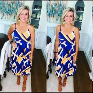 V-neck spaghetti strap accordion dress. NWT.